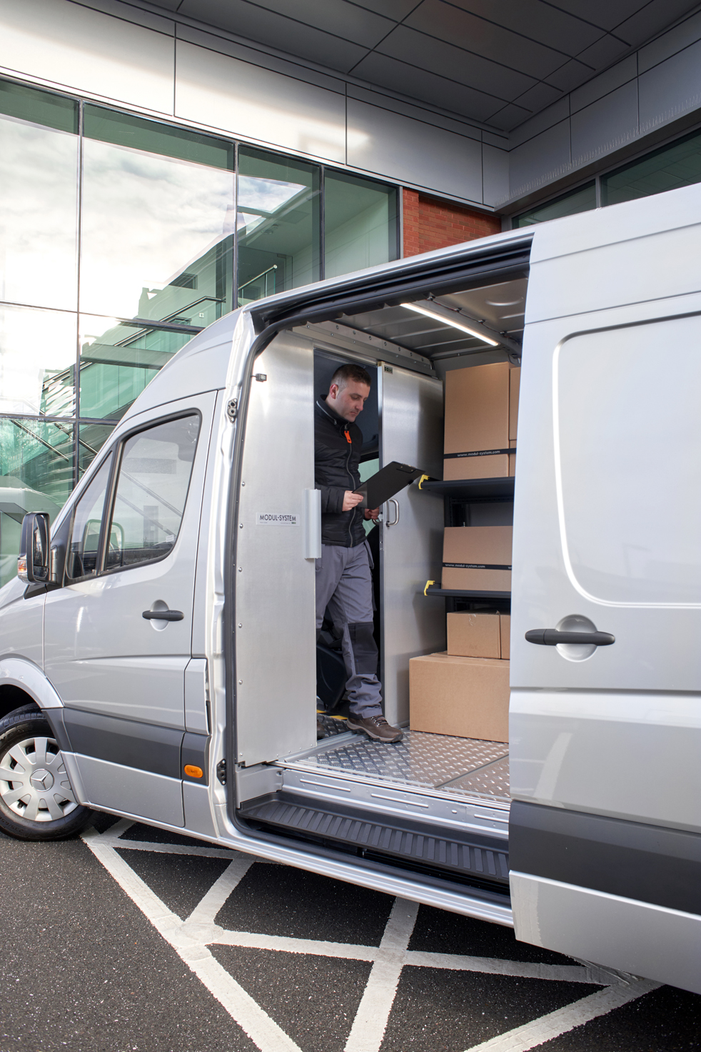 Ford Transit fitted out with modul-express van shelving for delivery